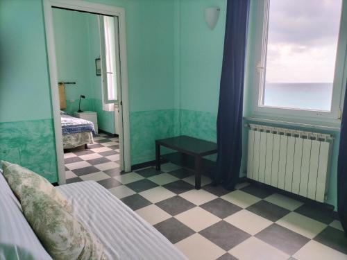 En eller flere senge i et værelse på La Bouganville Beatiful Sea view