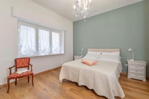 Ένα ή περισσότερα κρεβάτια σε δωμάτιο στο De Sanctis-Apartment