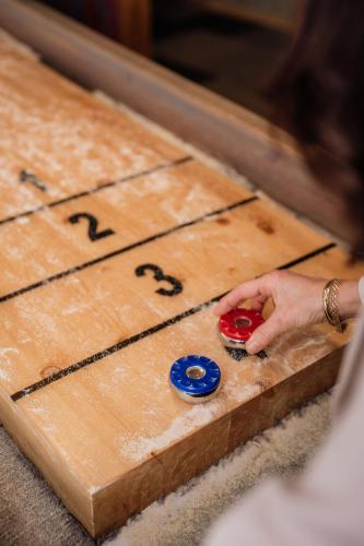 a person is playing a game on a cutting board at Bohusgården Hotell & Konferens in Uddevalla