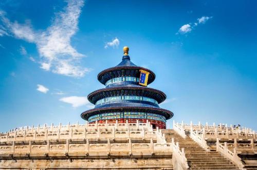 a building with a blue turret on top of it at Capital Hotel in Beijing