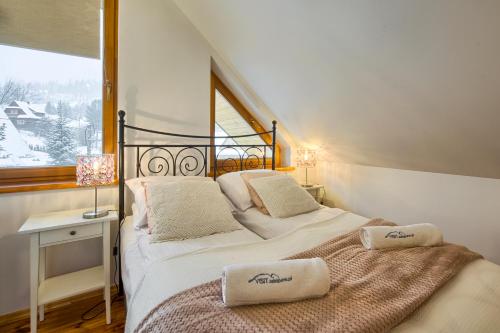 Posteľ alebo postele v izbe v ubytovaní VisitZakopane- Mallorca Apartment