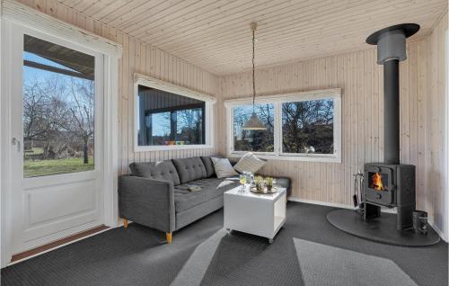 O zonă de relaxare la Four-Bedroom Holiday Home In Juelsminde