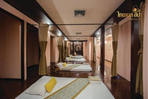 Katil atau katil-katil dalam bilik di Topland Hotel & Convention Centre