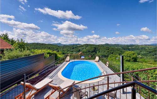 a swimming pool on the balcony of a house at Awesome Home In Jalzabet With Kitchen in Jalžabet