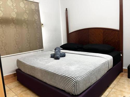 Ένα ή περισσότερα κρεβάτια σε δωμάτιο στο 3BR at Pantai HillPark near University Malaya Mid Valley