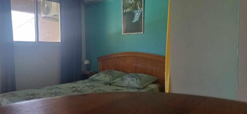 Postel nebo postele na pokoji v ubytování L'harmonie