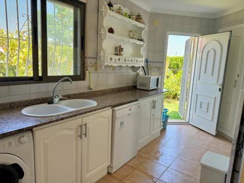 Η κουζίνα ή μικρή κουζίνα στο Libertad LOCDENIA