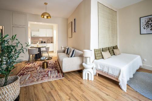 Ένα ή περισσότερα κρεβάτια σε δωμάτιο στο L'Impérium Suite - Les Halles - Narbonne