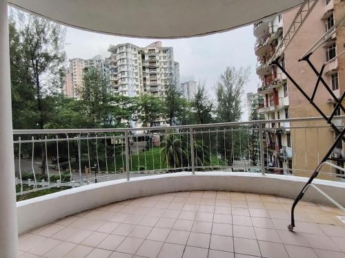 a balcony with a view of a city at Venice Hill Cheras Young Forever Homestay in Cheras
