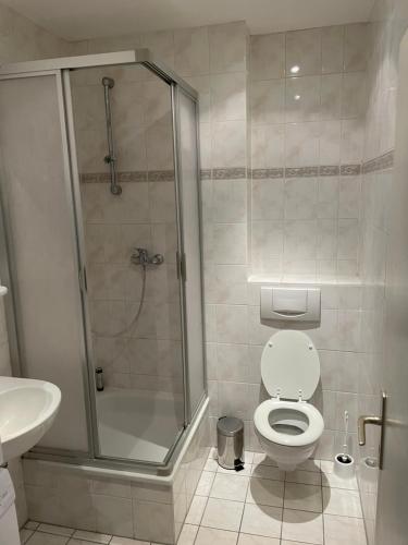 Koupelna v ubytování Max Appartements