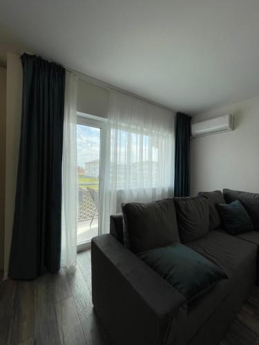 Гостиная зона в Comfort & Luxury Apartaments PNMresidence