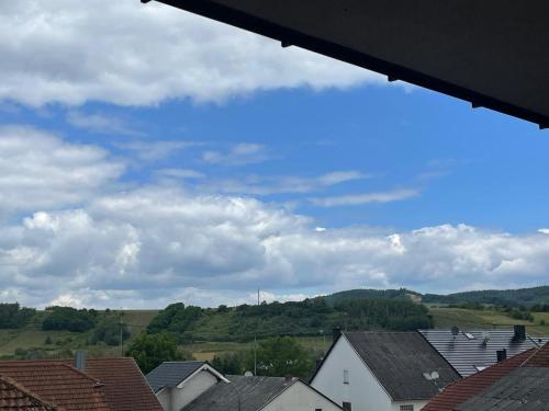 a view of roofs of houses in a town at Ferienwohnungen Im Kimmelreich in Irsch