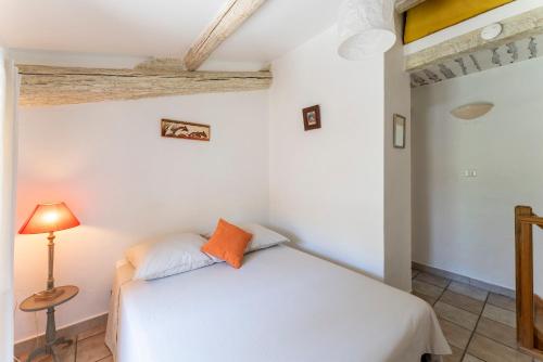 Cama o camas de una habitación en Le Mazet de Cabrières-d'Avignon