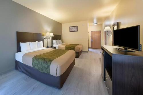 Ein Bett oder Betten in einem Zimmer der Unterkunft Econo Lodge Inn & Suites Bridgeport