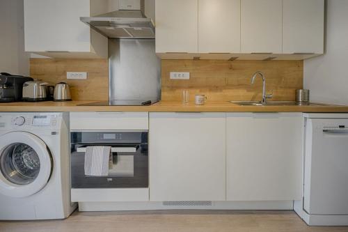 Kuchyň nebo kuchyňský kout v ubytování Le Panoramique ~ Euralille ~ Arrivée Autonome