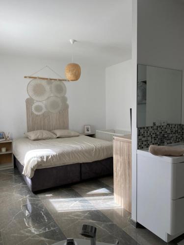 Ένα ή περισσότερα κρεβάτια σε δωμάτιο στο Villa piscine