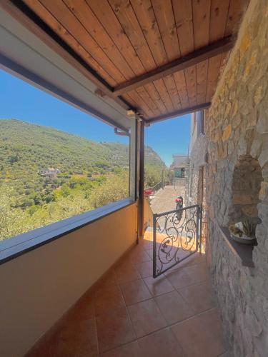 a view from the balcony of a house with a large window at Casa Viromar - De Vivo Realty in Meta