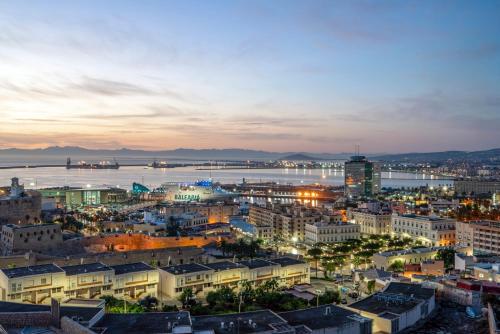 a view of a city at night at Parador de Melilla in Melilla