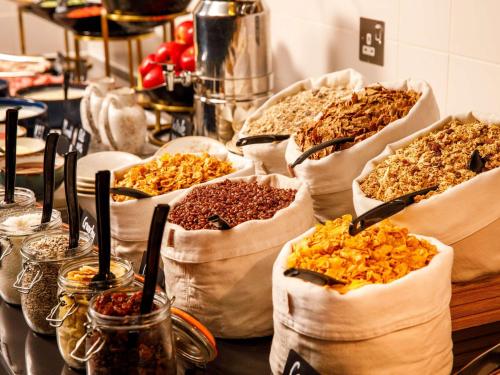 a group of bags filled with different types of food at ibis London Canning Town in London