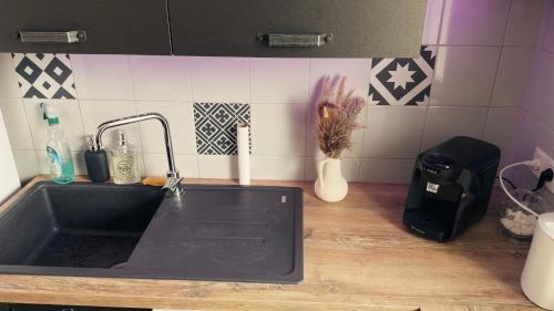 Kuchyň nebo kuchyňský kout v ubytování Appartement T3 Clermont-Ferrand