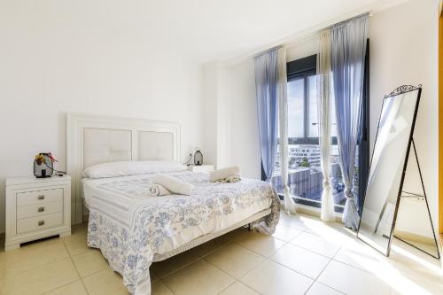 Postel nebo postele na pokoji v ubytování A&N LA VEGA 6