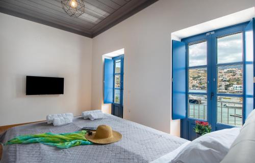 Giường trong phòng chung tại Porto Harani Seaside Apartments