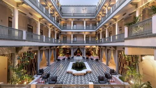 a view of the lobby of a hotel at Manuscript - Jhilwara Haveli in Udaipur