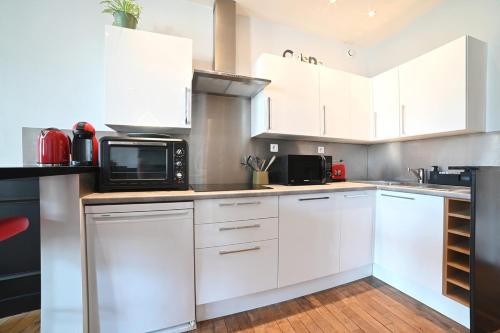 Køkken eller tekøkken på Le Collectionneur