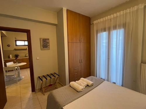 Postel nebo postele na pokoji v ubytování Coral Studio