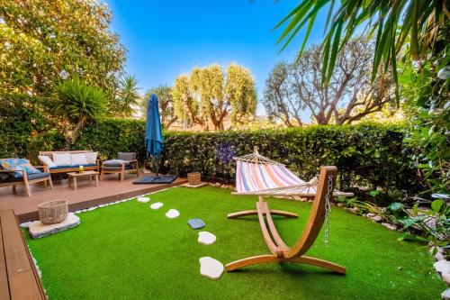 Photo de la galerie de l'établissement Le Riviera ~ Jardin ~ Parking ~ Climatisation, à Cagnes-sur-Mer