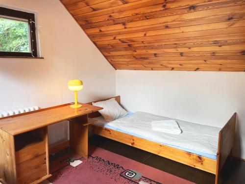 Postel nebo postele na pokoji v ubytování Chata Radužel