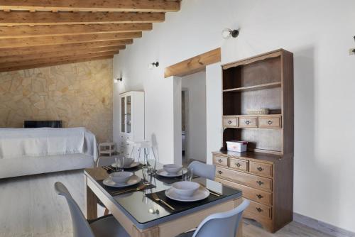 Postel nebo postele na pokoji v ubytování Casa Faquinse La Muela 1