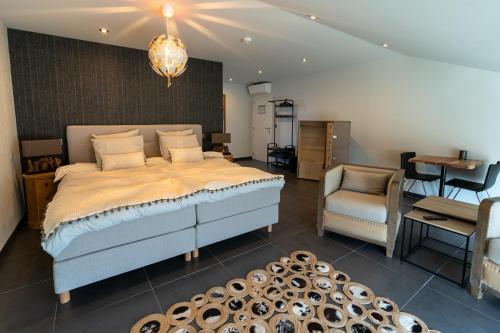 Postel nebo postele na pokoji v ubytování B&B De Vlierbeek