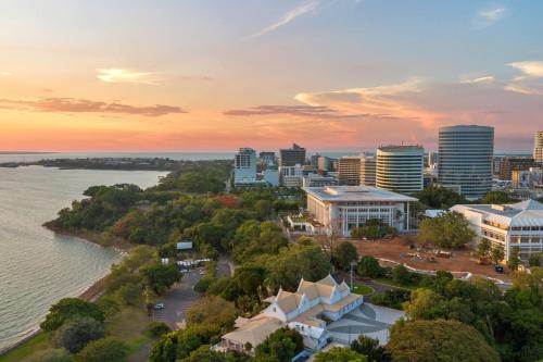 an aerial view of a city next to the water at Woodys at the Waterfront in Darwin