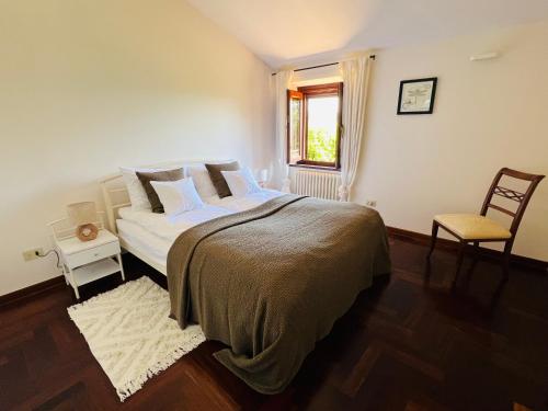 Ένα ή περισσότερα κρεβάτια σε δωμάτιο στο Casa di Dario
