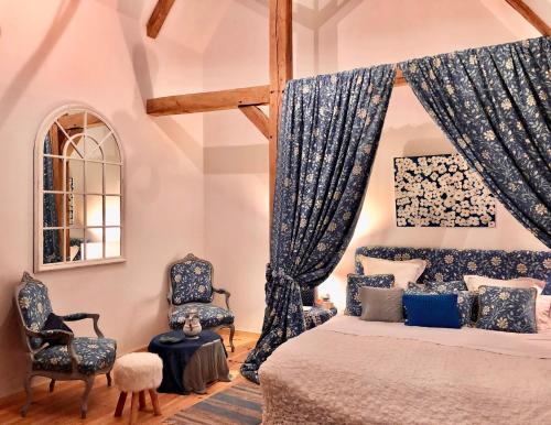 Postel nebo postele na pokoji v ubytování Chateau de Vauchelles
