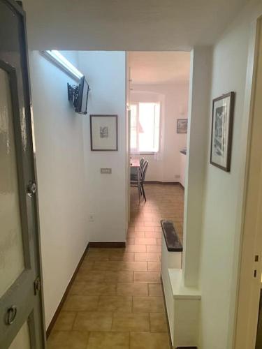 a hallway with a hallway leading to a room at La Casetta in Chiavari