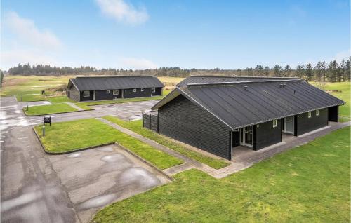 an overhead view of two buildings in a field at 2 Bedroom Stunning Home In Pandrup in Pandrup