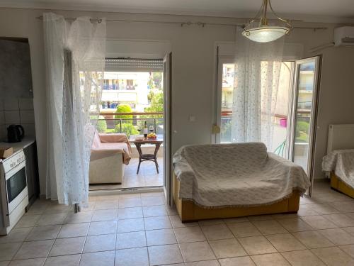 Ένα ή περισσότερα κρεβάτια σε δωμάτιο στο Apartment on the beach