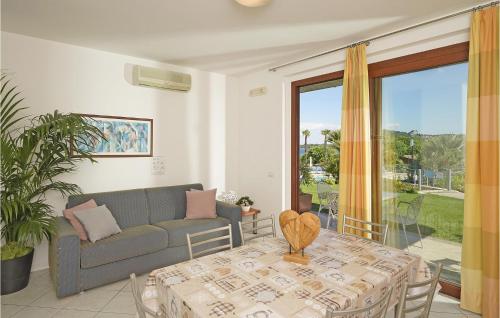 Ένα ή περισσότερα κρεβάτια σε δωμάτιο στο Bilocale