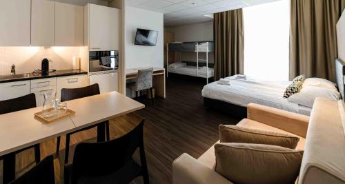 Kuchyň nebo kuchyňský kout v ubytování Los Lorentes Apartments Bern Airport