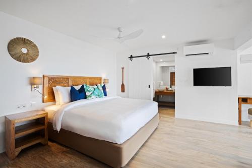 Voodi või voodid majutusasutuse The Bay Seychelles Boutique Hotel and Apartments toas