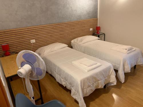 Postel nebo postele na pokoji v ubytování Casali Scjs
