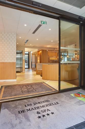 Лобби или стойка регистрации в Jardins de Mademoiselle Hôtel & Spa