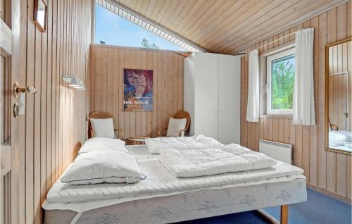 Katil atau katil-katil dalam bilik di Holiday Home Uranusvej Ii