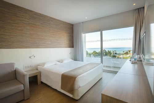 Voodi või voodid majutusasutuse MARGADINA HOTEL toas