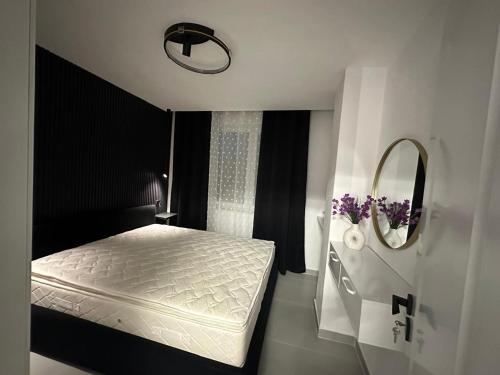 Katil atau katil-katil dalam bilik di Sunset Apartment