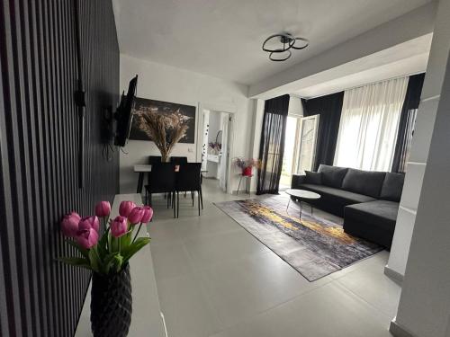 Televisyen dan/atau pusat hiburan di Sunset Apartment