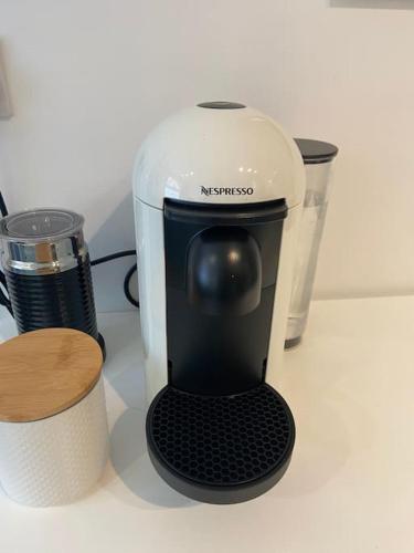 a black and white blender sitting on a counter at Stunning City centre Georgian townhouse - parking in Chester