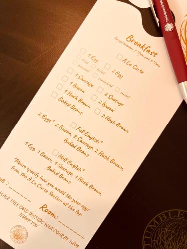 Chứng chỉ, giải thưởng, bảng hiệu hoặc các tài liệu khác trưng bày tại Tumbleweed Cottage